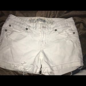 White cutoff frayed destroyed shorts express jeans